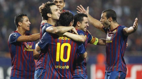 Barca lifts Super Cup with a tattered display