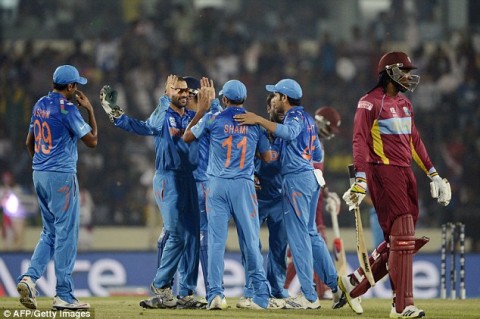 India strolls past West Indies to top Group 2