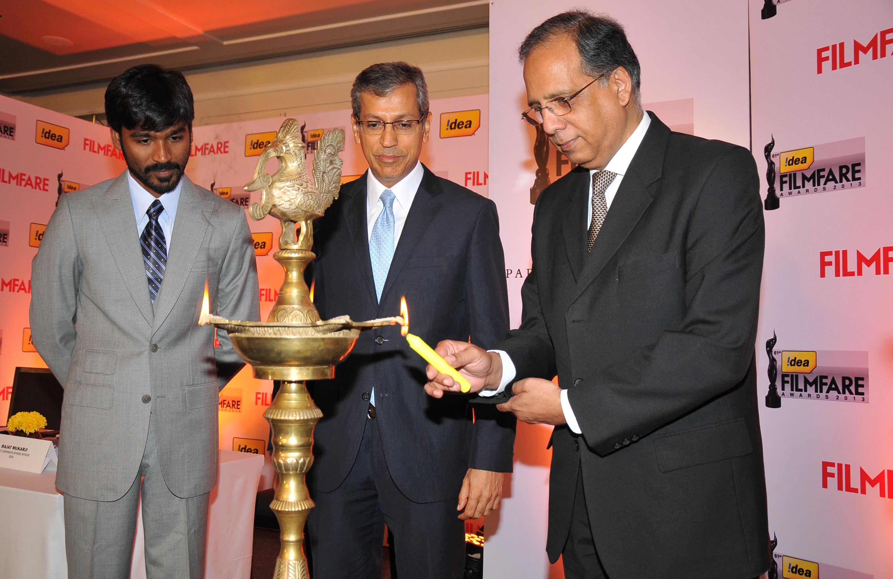 Dhanush, Mr. Tarun Rai (CEO, WWM) & Mr. Rajat Mukarji (CCAO, Idea Cellular) at the innauguration of '61st Idea Filmfare Awards 2013' Press Conference at Park Hyatt Hotel, Chennai.2