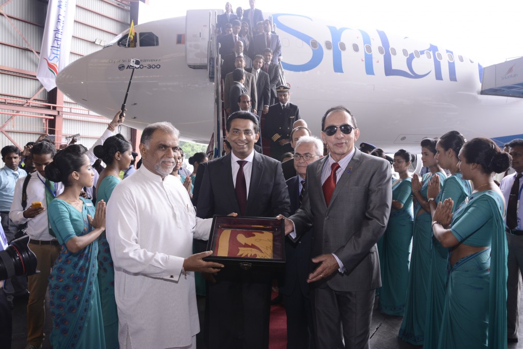 From (Left-Right) Deputy Minister Civil Aviation, Mr.GeethanjanaGunawardane, SriLankan Airlines CEO, Mr. Kapila Chandrasena and Chairman Mr. Nishantha Wickremasinghe, ceremoniously