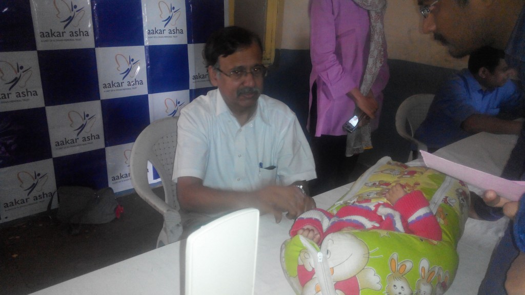 Dr. Bhratendu Swain checking patients in One Rupee Reconstructive Surgery Camp