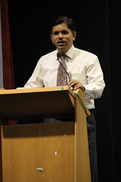 Principal, Prof. Suhas Pednekar addressing the gathering.