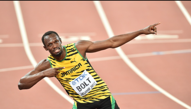 Bolt celebrating his 100m victory; Image Source: Getty Images