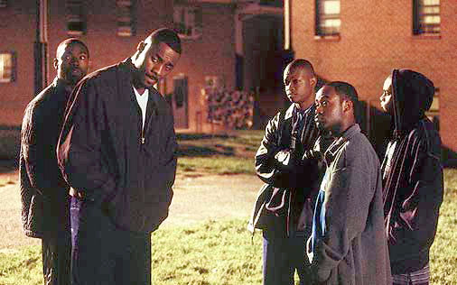 Idris Elba as Stringer with his co-stars