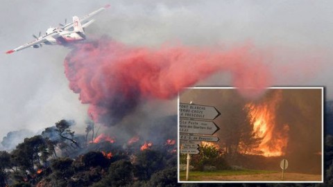 Wildfire erupts in France, scores flee across