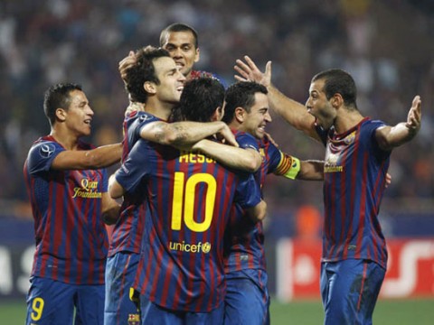 Barca lifts Super Cup with a tattered display