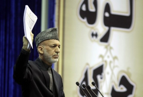 Karzai says he will not sign security deal if drone attacks continue