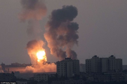 Hamas targets Israel cities; army determined to fight back